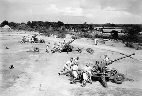 three_40_mm_bofors_guns.jpg